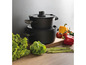 Zwei schwarze Töpfe mit Glasdeckel, umgeben von Gemüse.