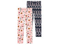 Zwei Paar Mädchen-Leggings mit Weihnachtsmotiven: eine mit Rentieren und Zuckerstangen und eine mit Schneeflocken und Herzen.