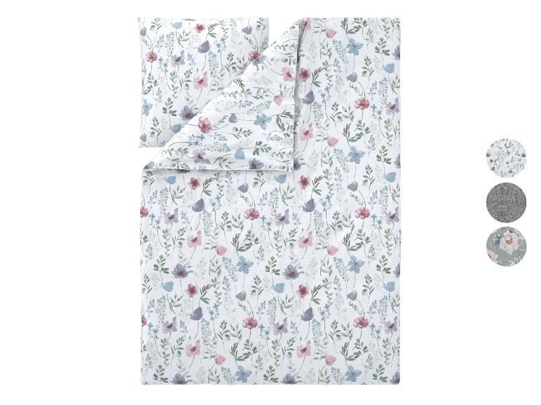 Bettwäsche-Set mit Blumenmuster in Weiß, Rosa, Blau und Lila.