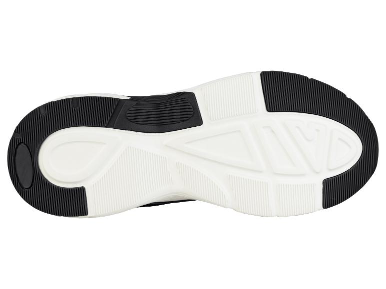 Schwarz-weiße Sportschuhsohle mit texturiertem Profil