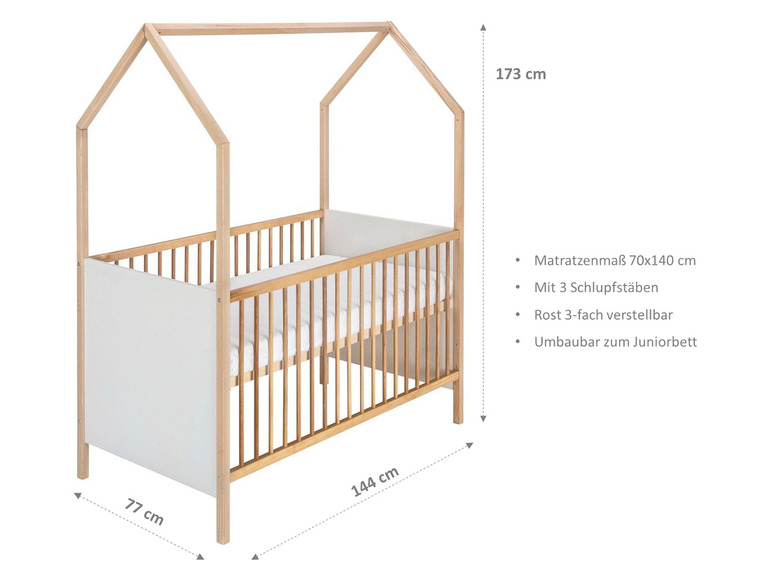 Ein Holz-Babybett mit einem Hausdach, inklusive Matratze und verstellbarem Boden.