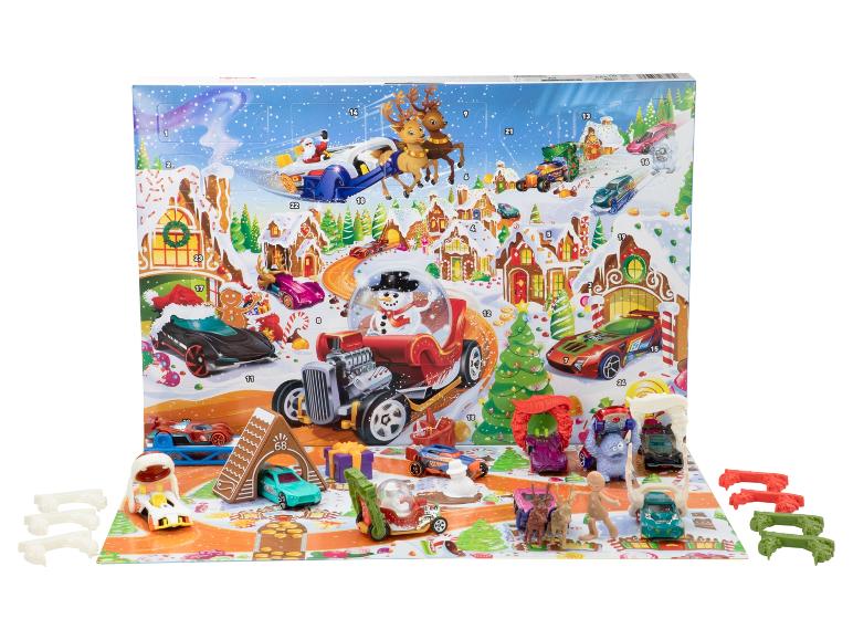 Hot Wheels Adventskalender mit Autos und Zubehör in einer Winterlandschaft.