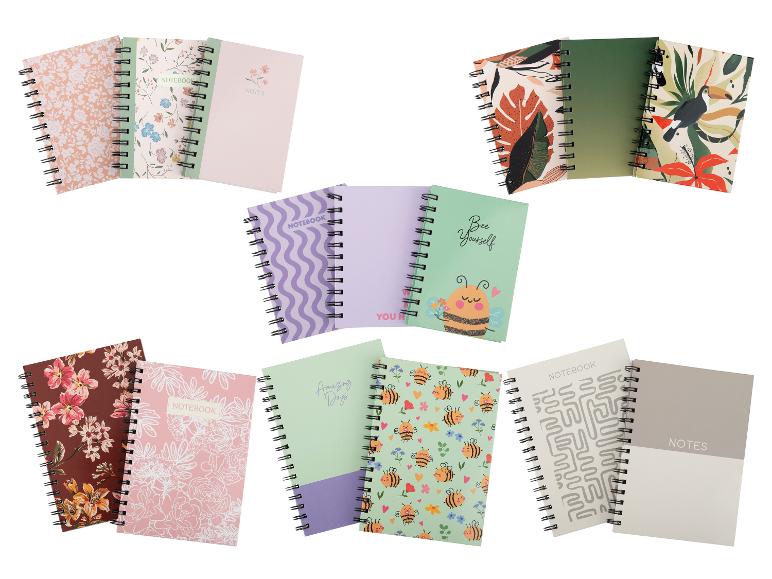 Sortiment an Spiralnotizbüchern mit verschiedenen Blumen-, Natur- und geometrischen Designs