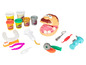 Play-Doh Spielset mit Zahnarztwerkzeug und Play-Doh-Dosen.