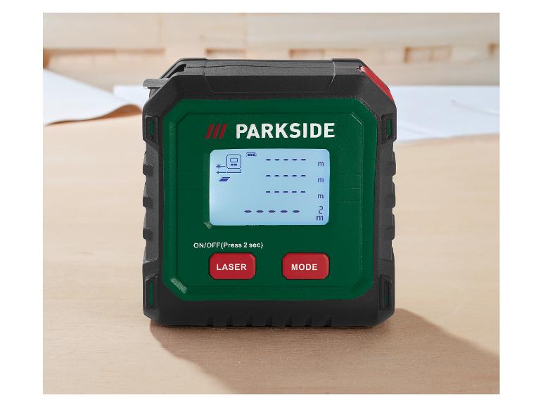 Laser-Entfernungsmesser mit Digitalanzeige und roten Tasten auf einer Holzoberfläche.