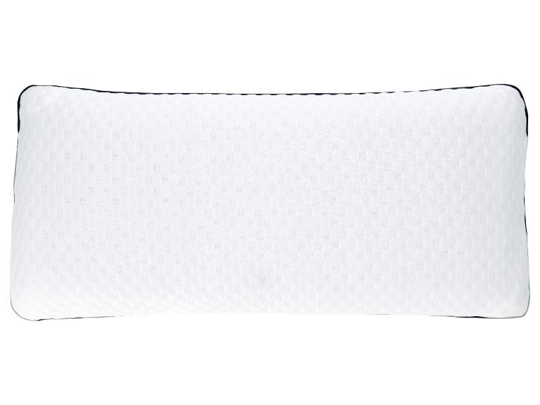 Weißes rechteckiges Kissen mit strukturiertem Muster.