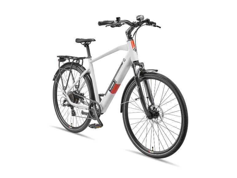 Weißes E-Bike mit schwarzen Komponenten, Gepäckträger und Schutzblechen, von der Seite gezeigt.
