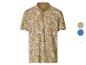 Kurzärmeliges Poloshirt mit tropischem Blattmuster in Beige und Weiß.