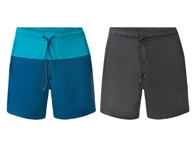 Zwei kurze Hosen, eine blau mit türkis und eine schwarze.