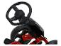 Rotes und schwarzes Tret-Gokart mit Lenkrad und Armaturenbrett