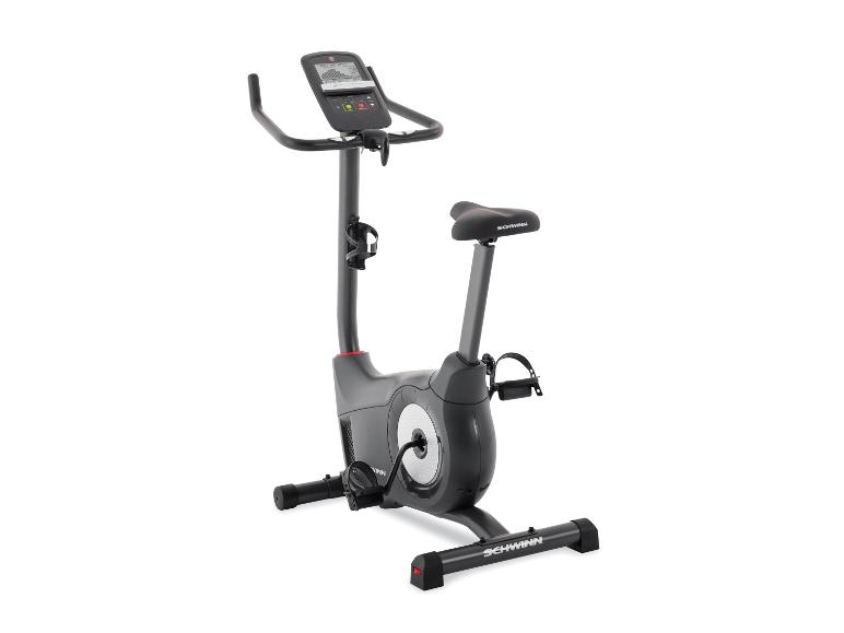 Graues Heimtrainer-Fahrrad mit schwarzem Sitz und Digitalanzeige.