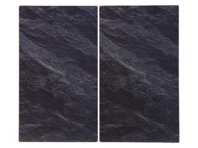 Zwei schwarze Schieferfliesen mit rauer Textur