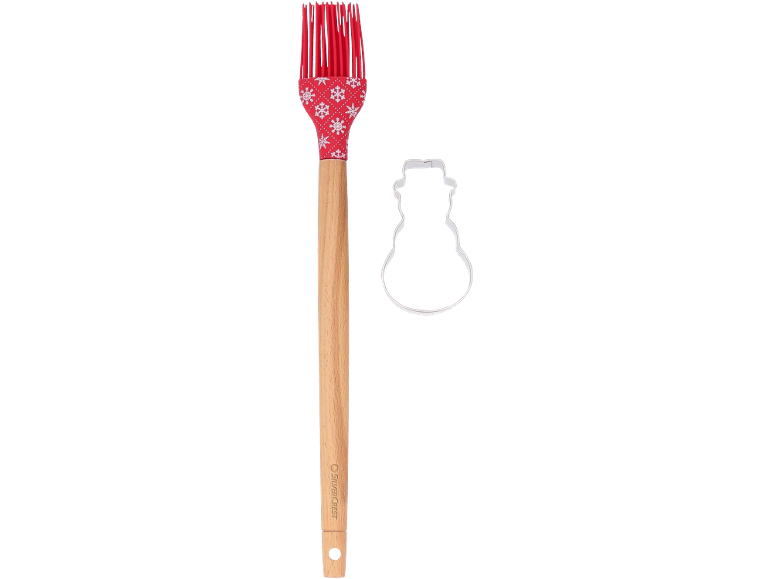 Backpinsel mit roter Silikonspitze und Schneemann-Ausstechform.