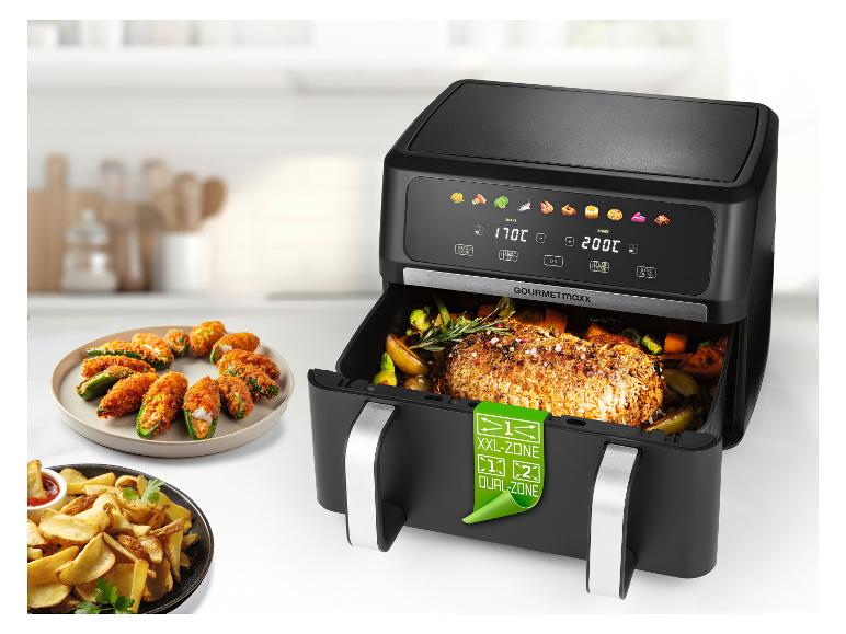 Heißluftfritteuse mit zwei Körben, Braten, Gemüse, Pommes und Jalapeño Poppers.