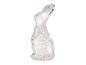 Weiße, glänzende Dekolampe in Hasenform mit spiralförmiger Oberfläche.