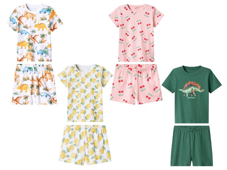 Kinderpyjamas: Dinosaurier, Kirschen, Zitronen und grün mit Stegosaurus.