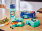 Paw Patrol Trinkflasche und Lunchboxen in Blau und Grün.