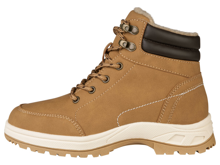 Ein brauner Schnürschuh mit weißer Sohle.