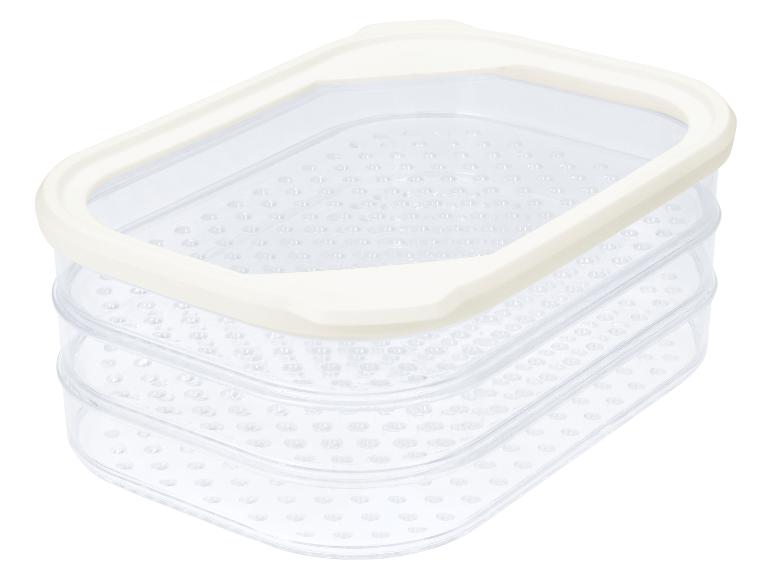 Transparenter dreistöckiger Lebensmittelbehälter mit weißem Deckel