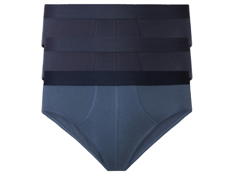 Drei Paar blaue Unterhosen.