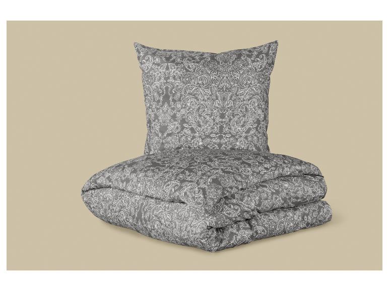 Graues Bettwäsche-Set mit weißem Muster, bestehend aus Bettbezug und Kissenbezug.