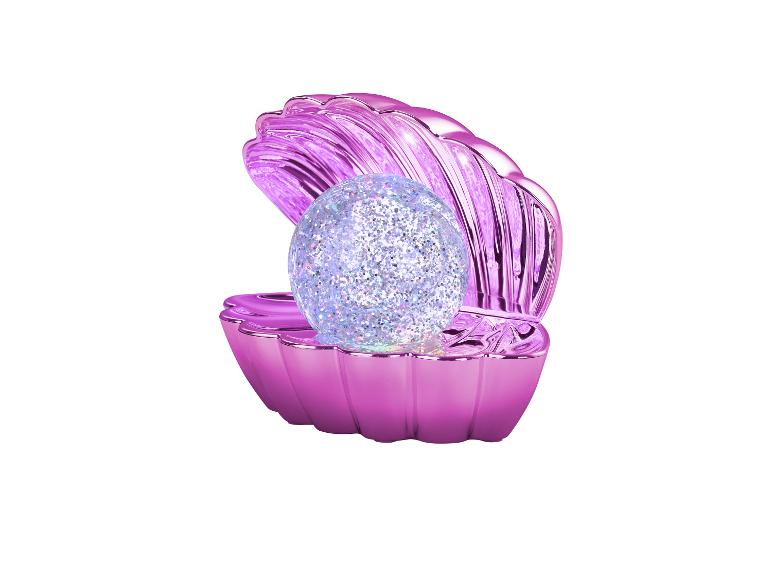 Offene rosa Muschel mit einer Glitzerkugel darin