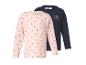 Set aus 2 Kinder-Langarmshirts, eines rosa mit Herzen und eines marineblau mit zwei Herzen.