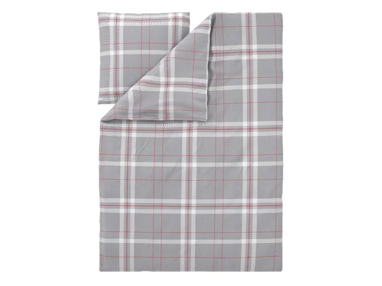 Graue und rote karierte Bettwäsche mit Kissen- und Bettbezug.