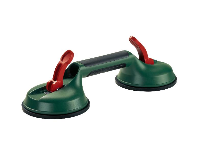 Grüner Saugnapf mit zwei roten Hebeln zur Handhabung von Fliesen oder Glas.