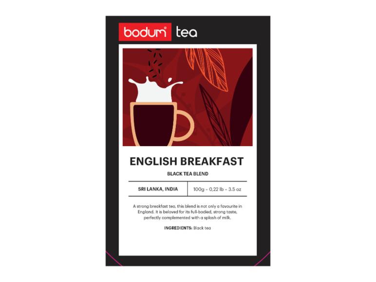 English Breakfast Teeverpackung mit Tasse und Teeblättern.