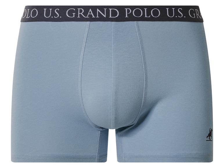 Hellblaue Baumwoll-Boxershorts mit dunklem Gummibund mit Text und Reiter-Logo.