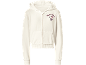 Cremefarbener Kapuzenpullover mit Reißverschluss, mit Cartoon-Figur und Schriftzug.