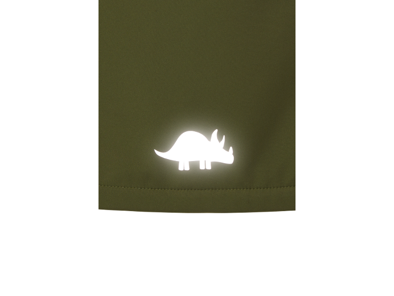 Detail eines reflektierenden Dinosaurier-Motivs auf olivgrünem Stoff.