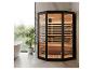 Moderne Infrarotsauna mit Glastür und Holzinterieur in einem Badezimmer