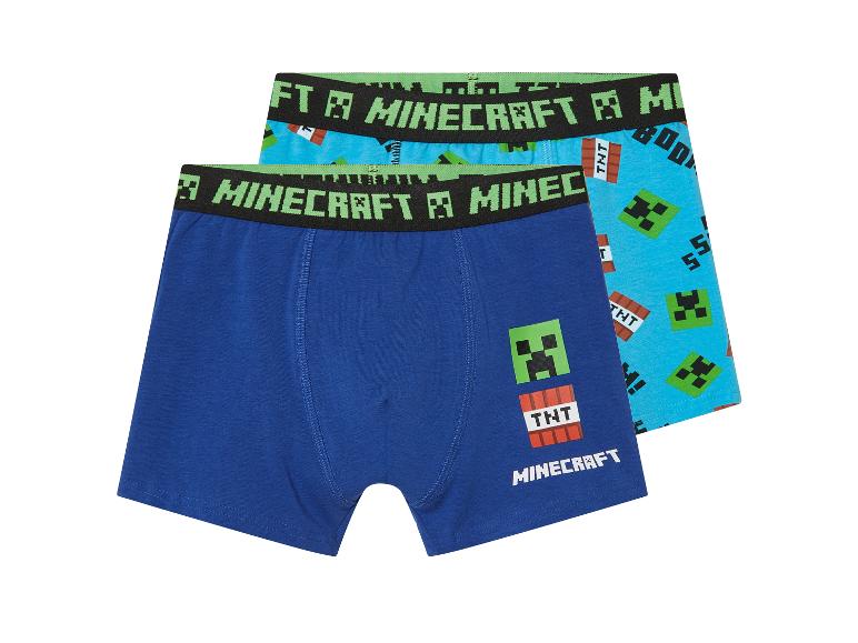 Zwei Minecraft-Boxershorts für Jungen: eine dunkelblaue und eine hellblaue mit Motiv.