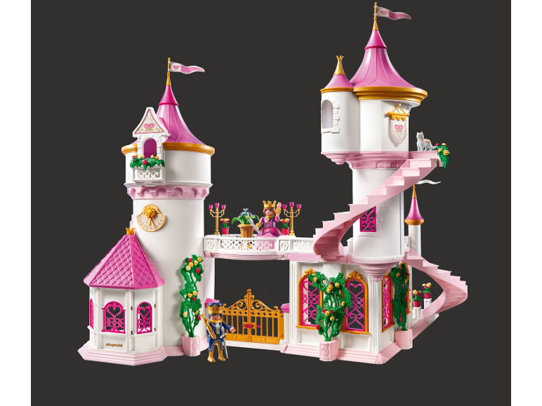 Weiß-rosa Spielzeugschloss mit Spielfiguren und goldenem Tor.