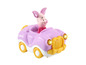 Ein rosafarbenes Cabrio Spielzeugauto mit Ferkel aus Winnie Puuh.