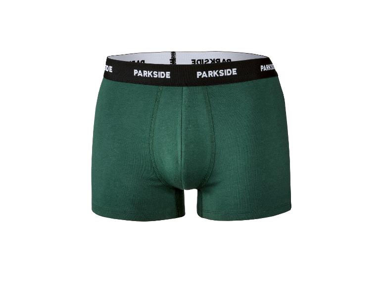Dunkelgrüne Baumwoll-Boxershorts mit schwarzem Gummibund und weißem Text.
