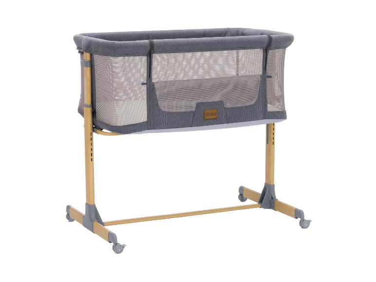 Fillikid Babybett in Grau mit Holzrahmen und verstellbarer Höhe.