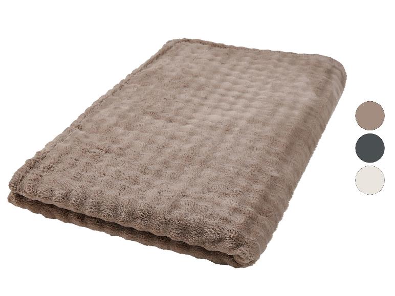 Weiche braune Decke mit Prägemuster und Farbauswahlkreisen.