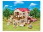 SYLVANIAN FAMILIES Stadthaus mit Dachzimmer, aufklappbar, mit Figuren und Zubehör im Garten.