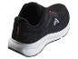 Schwarze Sportschuhe mit orangefarbenen Details und weißer Sohle, Rückansicht.