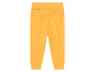Gelbe Hose für Babys.