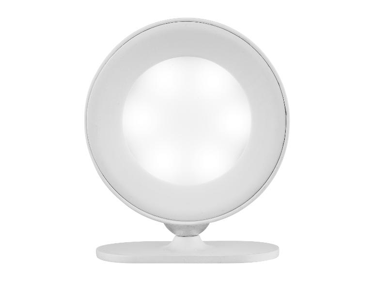 Ein runder, weißer Spiegel mit Beleuchtung