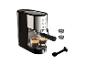Kaffeemaschine mit zwei Espressotassen, Messlöffel und Filtern.