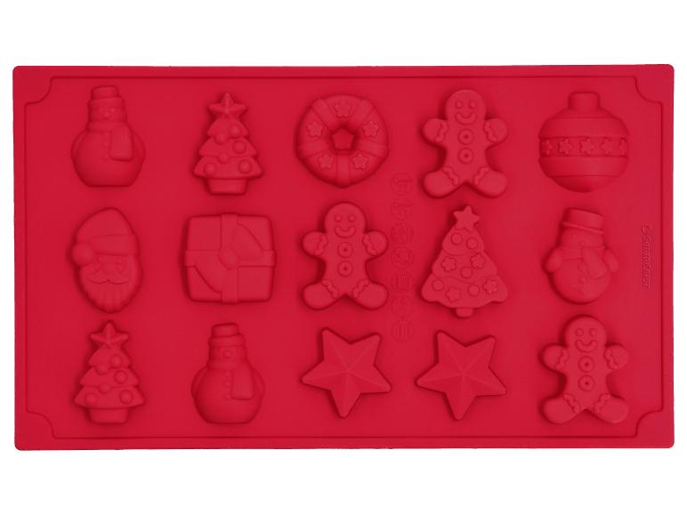 Rote Silikon-Backform mit 15 weihnachtlichen Motiven, darunter Weihnachtsmann, Schneemann und Weihnachtsbaum.