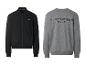 Schwarze Jacke mit Reißverschluss und graues Sweatshirt mit dem Text „STRENESSE BLUE“.