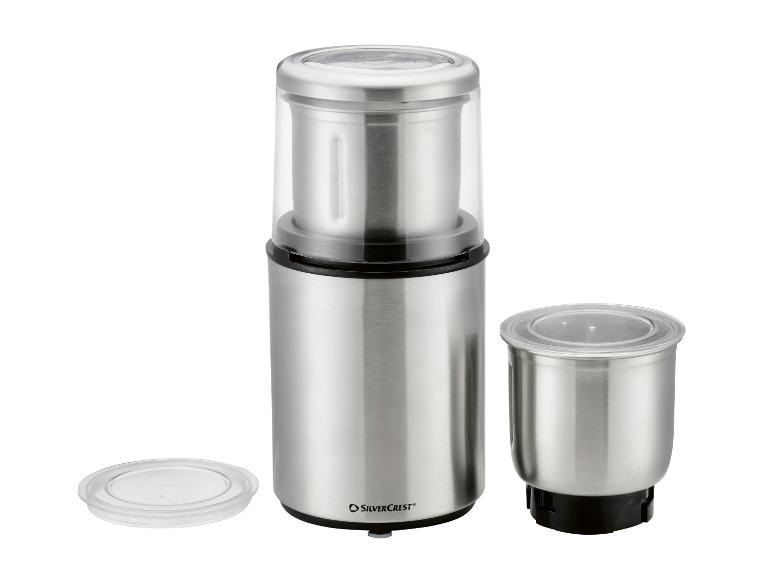 Edelstahl-Kaffee- und Gewürzmühle mit zwei Behältern und transparenten Deckeln.