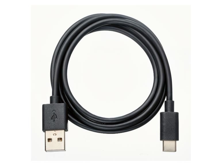 Schwarzes USB-Kabel mit USB-A- und USB-C-Anschlüssen, zu einem Kreis aufgerollt.