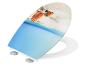 Toilettensitz mit Strand- und Muscheldruck, mit blauem Wasser und Sand.